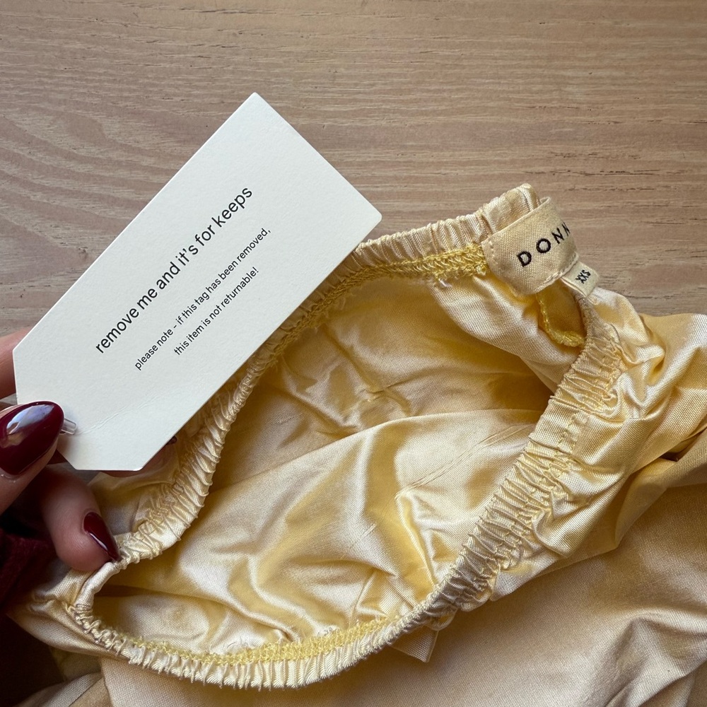 DONNI. Cream Straight Leg Pants